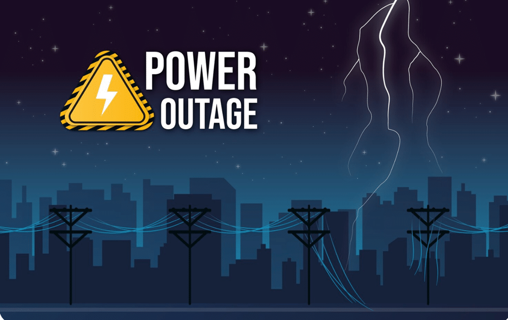 photo of lightening storm over a city with "Power Outage" notice