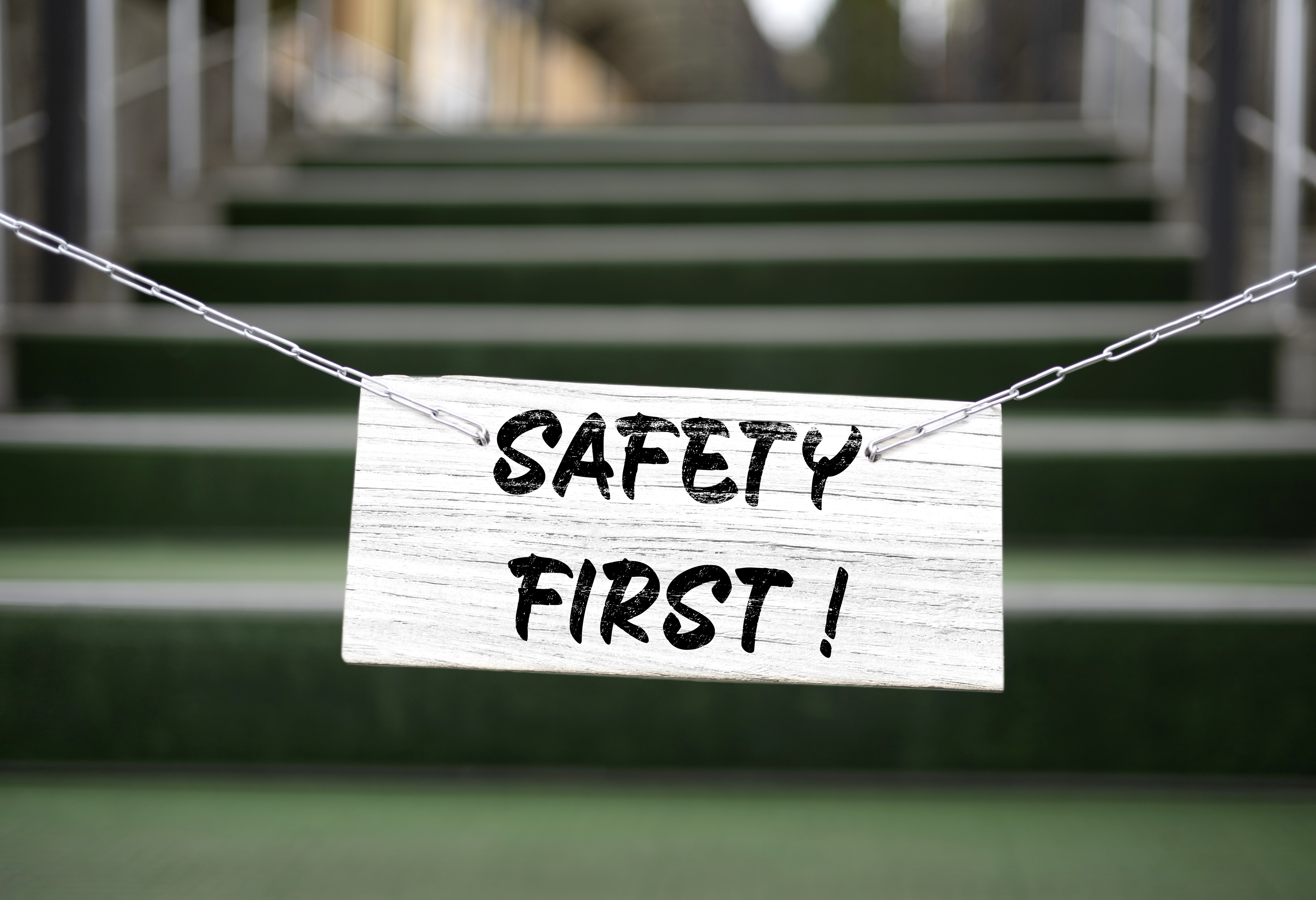 steps with a "Safety First!" sign chained across the entrance